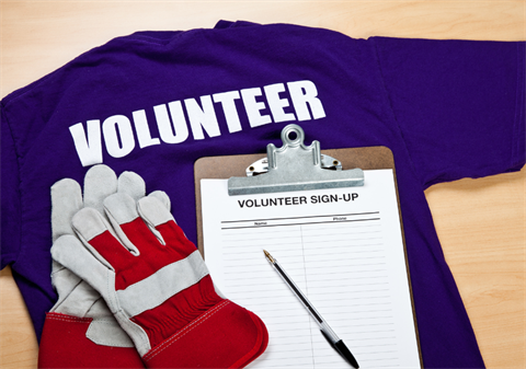 clipboard and gloves volunteer shirt